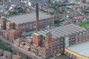 An external shot of the Spinners' Mill in Leigh, near Manchester