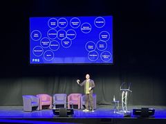 Youtube Quinns speaking at The Big Thing 2026, in front of a slide of all the various immersive industries in silos